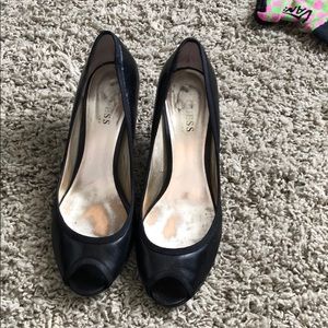 Guess Black open toe heeled shoes.